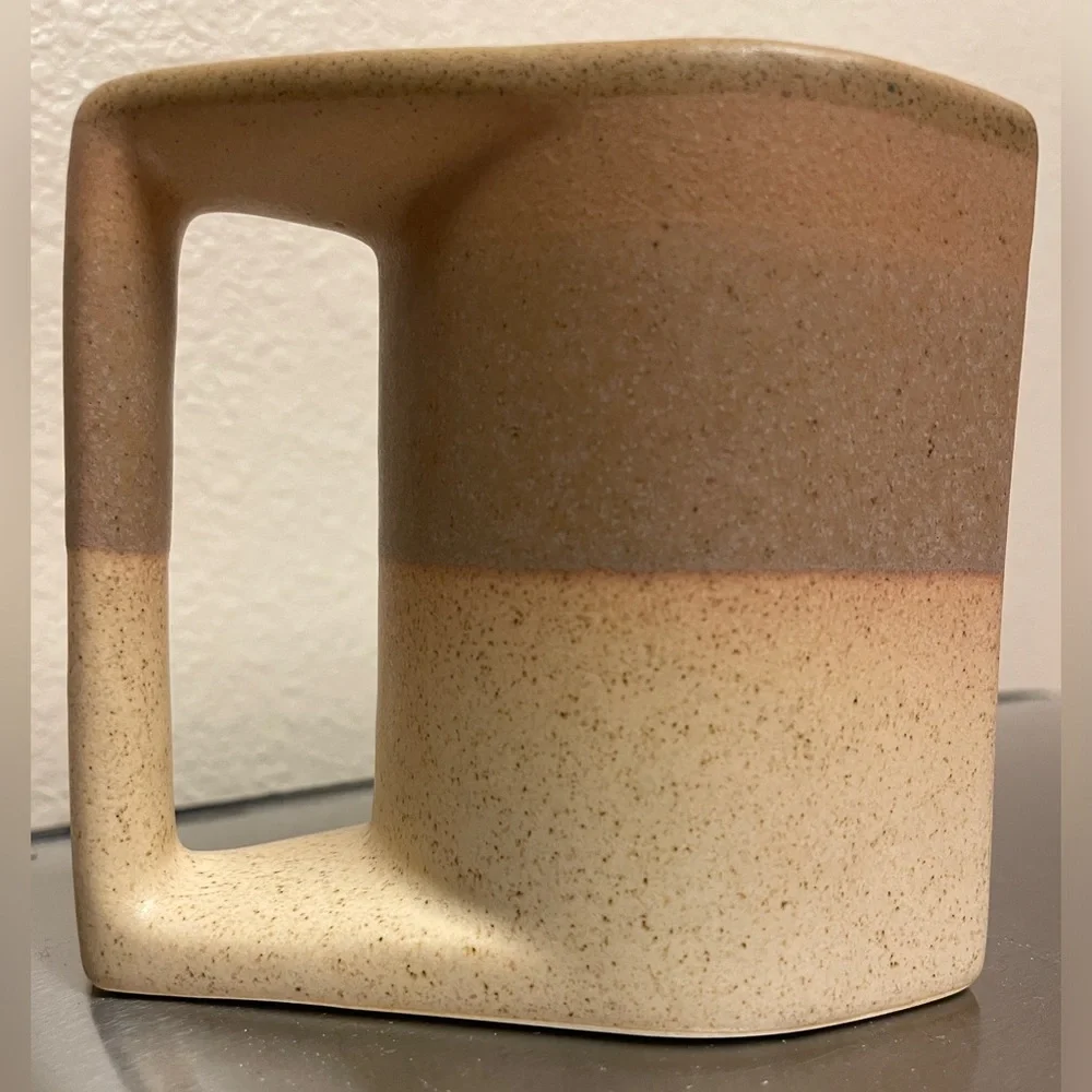 Rodolfo Padilla stacking mugs